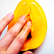 The Mango Passion — ripe mango flesh yielding under gentle pressure